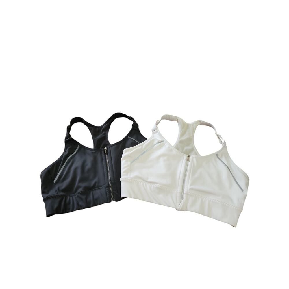 ATLETA TOP TALLA M PAQUETE DE 2 BLANCO Y NEGRO ( NO LLEVAN LAS ALMOHADILLAS )